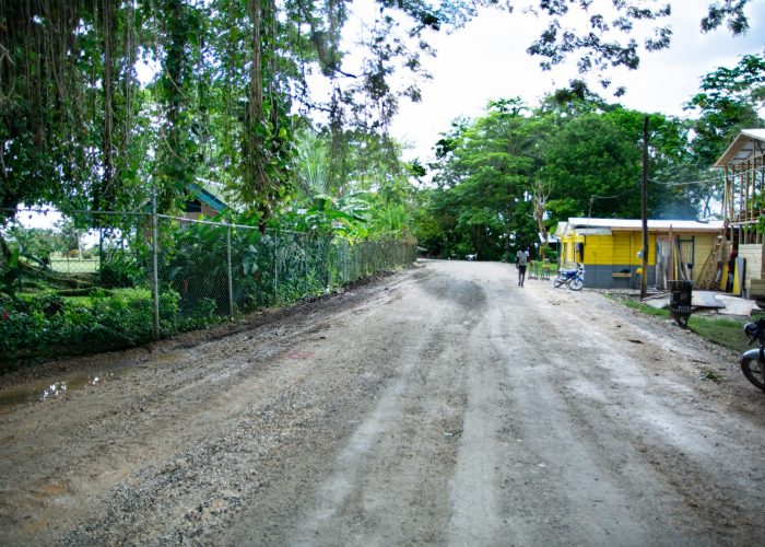 road leading to roaring river